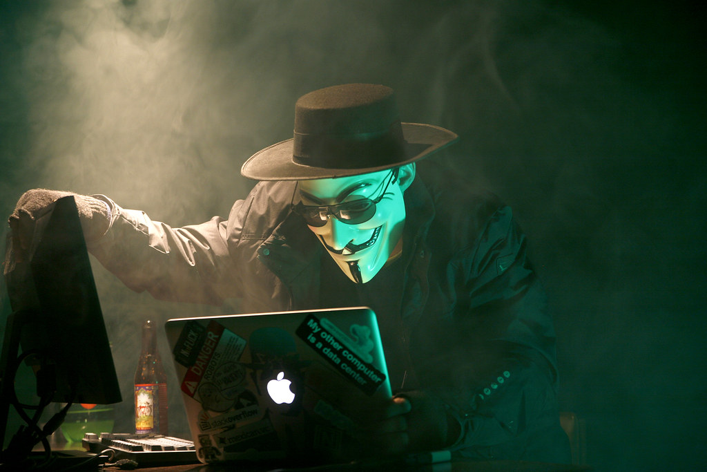 "Anonymous Hacker" by dustball is licensed under CC BY-NC 2.0.